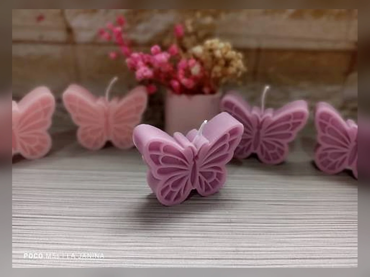 Vela artesanal en forma de mariposa